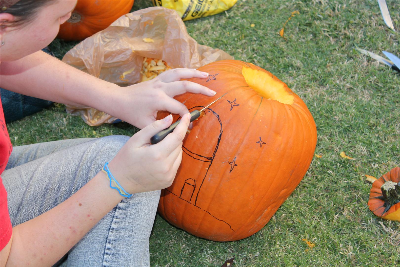 Katie carving an observatory